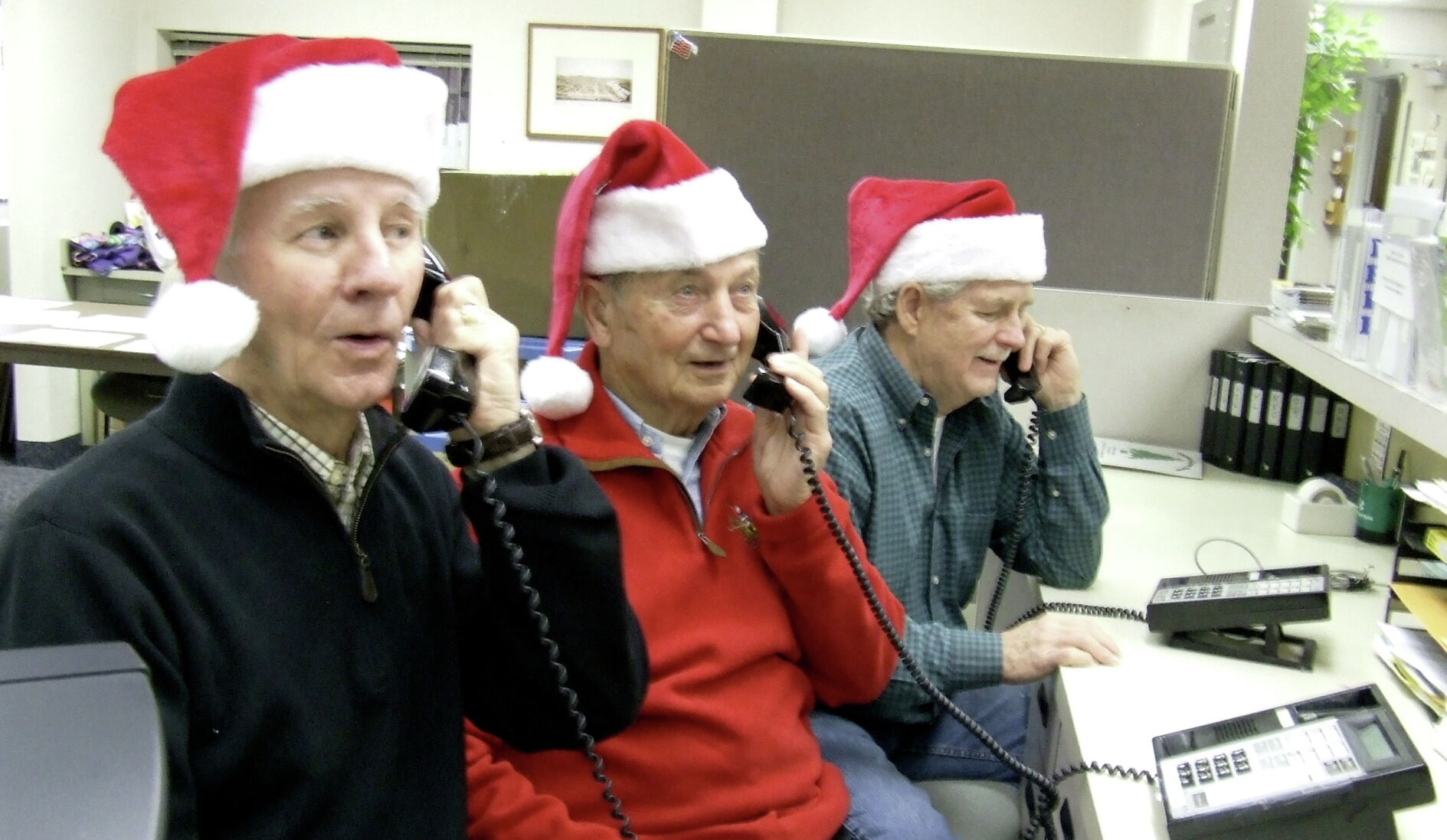 Dean Massett, Dan Mjolsness, Tom Schooley santa phones.jpg